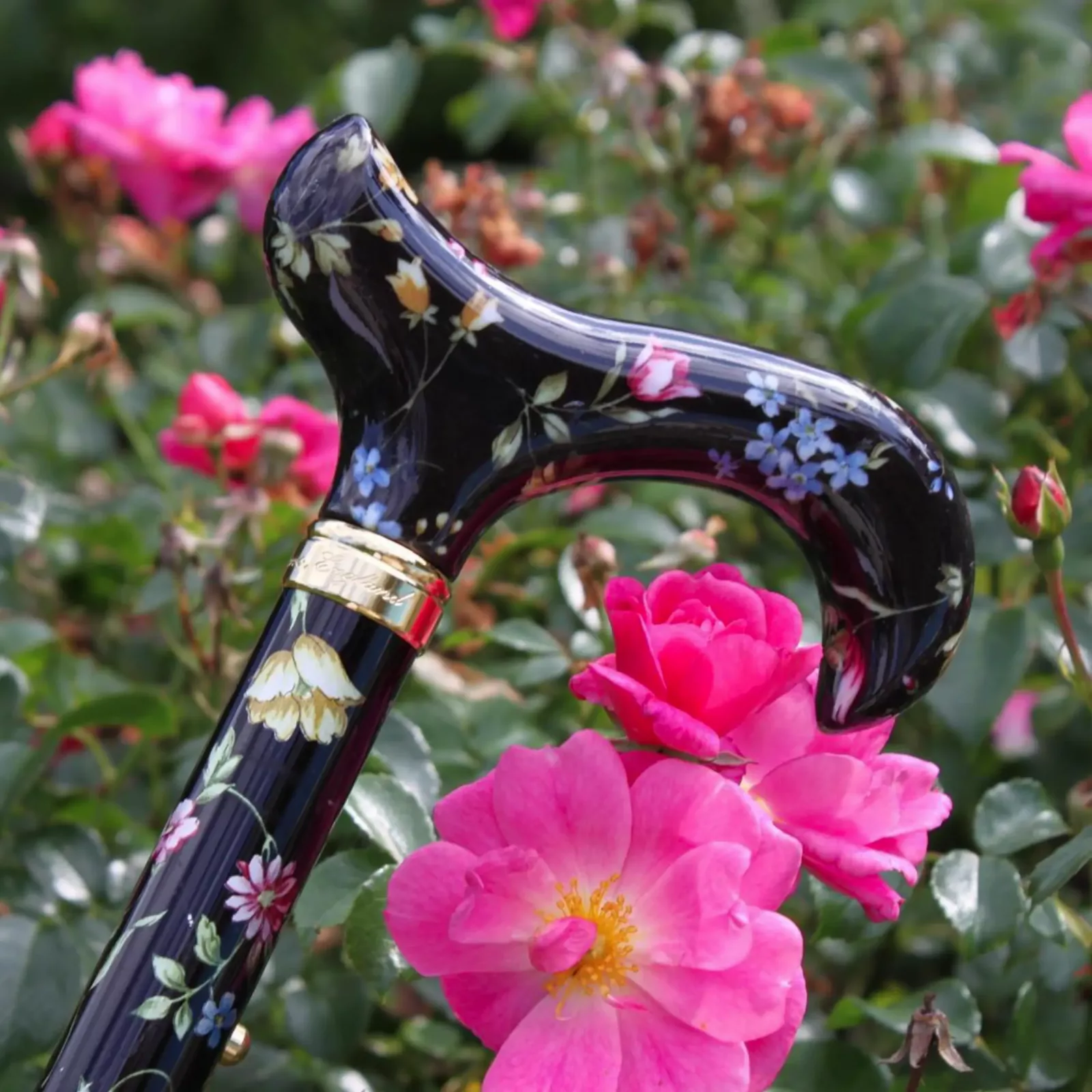 canne de marche réglable noire avec des motifs floraux