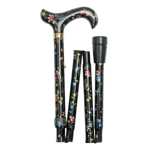 canne pliable noire avec des fleurs